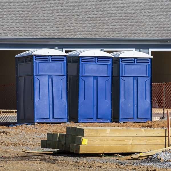 what is the cost difference between standard and deluxe portable restroom rentals in Edgewood New Mexico